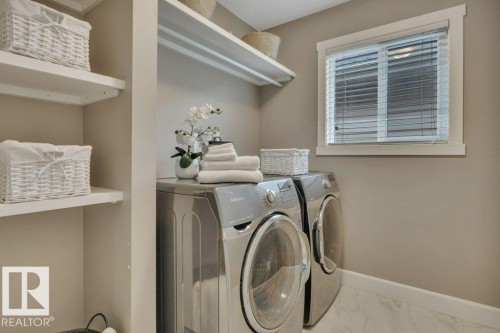 1958 Ainslie Link, Edmonton, AB - Indoor Photo Showing Laundry Room