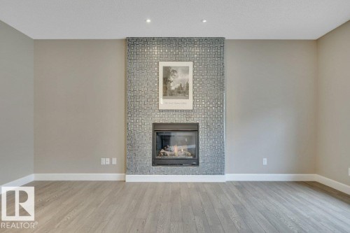 1958 Ainslie Link, Edmonton, AB - Indoor Photo Showing Living Room With Fireplace