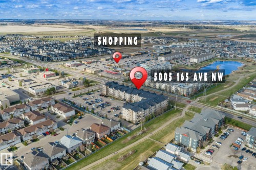 Aerial perspective showcasing a multi-unit residential building within a developed urban area - 412 5005 165 Avenue Nw, Edmonton, AB - Outdoor With View
