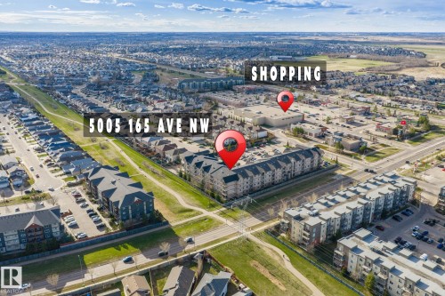 Aerial perspective of a developed residential area featuring numerous multi-unit buildings - 412 5005 165 Avenue Nw, Edmonton, AB - Outdoor With View