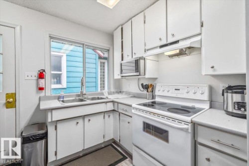 11428 79 Avenue, Edmonton, AB - Indoor Photo Showing Kitchen With Double Sink