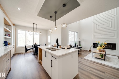 8808 183 Avenue, Edmonton, AB - Indoor Photo Showing Kitchen With Fireplace With Double Sink With Upgraded Kitchen