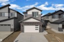 Modern two-story residence featuring a striking multi-toned exterior with vertical siding, horizontal siding, and brick-look accents - 12 Dalquist Bay, Leduc, AB  - Outdoor 