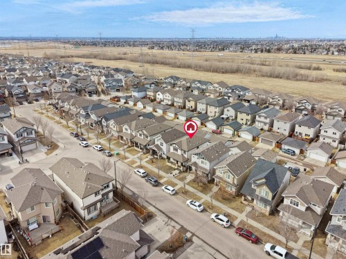 Aerial perspective showcasing a residential street with detached homes - 5192 1B Ave Sw, Edmonton, AB - Outdoor With View