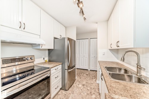 1404 11307 99 Avenue, Edmonton, AB - Indoor Photo Showing Kitchen With Double Sink