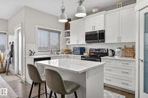 94 Tribute Common, Spruce Grove, AB - Indoor Photo Showing Kitchen With Upgraded Kitchen