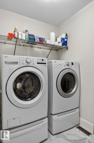 94 Tribute Common, Spruce Grove, AB - Indoor Photo Showing Laundry Room