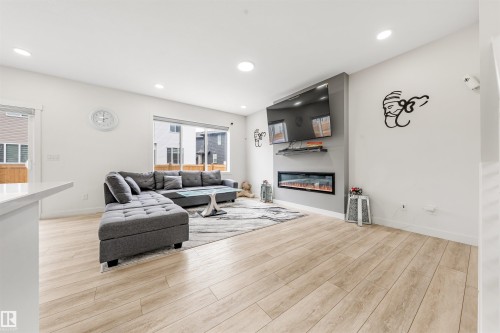 2629 15A Avenue, Edmonton, AB - Indoor Photo Showing Living Room With Fireplace