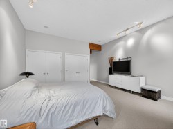 Light gray painted walls with white trim and a carpeted floor - 
