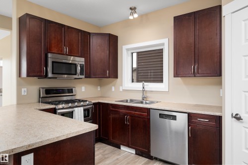 3420 Cutler Crescent, Edmonton, AB - Indoor Photo Showing Kitchen With Double Sink