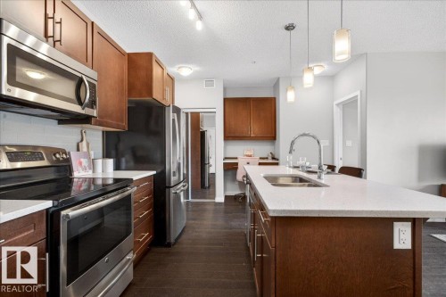 205 507 Albany Way, Edmonton, AB - Indoor Photo Showing Kitchen With Stainless Steel Kitchen With Double Sink With Upgraded Kitchen