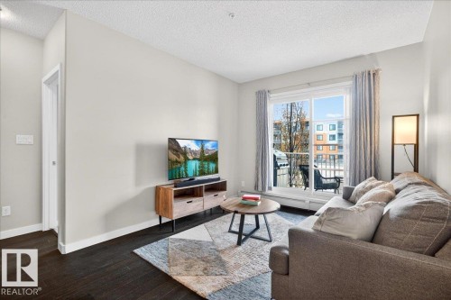 205 507 Albany Way, Edmonton, AB - Indoor Photo Showing Living Room