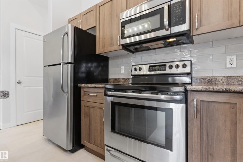 9302 120 Avenue, Edmonton, AB - Indoor Photo Showing Kitchen With Stainless Steel Kitchen