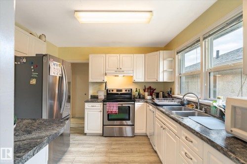 10651 66 Avenue, Edmonton, AB - Indoor Photo Showing Kitchen With Double Sink