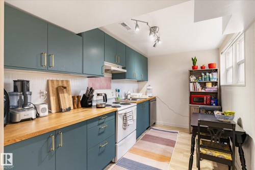 10651 66 Avenue, Edmonton, AB - Indoor Photo Showing Kitchen