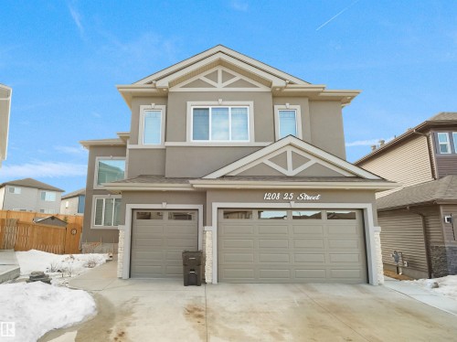 Contemporary two-story residence with a stucco exterior - 1208 25 St Nw, Edmonton, AB - Outdoor
