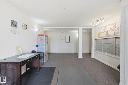 Mailroom with individual mailboxes and a bulletin board - 120 13625 34 Street, Edmonton, AB - Indoor
