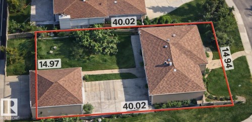 Aerial overview of property's location featuring property boundaries highlighted - 12436 St Albert Trail, Edmonton, AB 