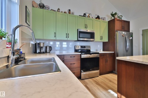 45 Poplar Bay, Rural Wetaskiwin County, AB - Indoor Photo Showing Kitchen With Double Sink