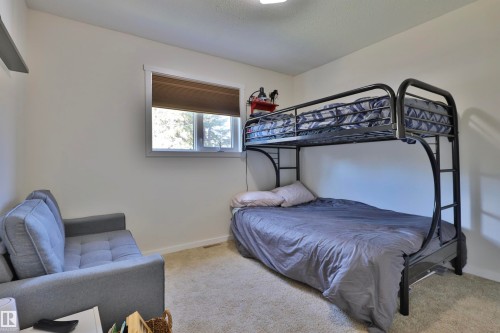 45 Poplar Bay, Rural Wetaskiwin County, AB - Indoor Photo Showing Bedroom