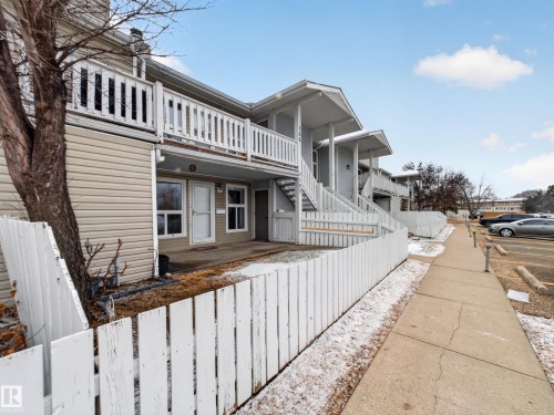 Multi-level residential building featuring horizontal siding and individual ground-floor patios - 165 2703 79 Street, Edmonton, AB - Outdoor