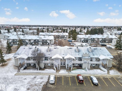 Low-rise multi-unit buildings featuring pitched roofs and multiple private balconies - 165 2703 79 Street, Edmonton, AB - Outdoor With View