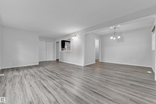 Light gray wood-finish flooring throughout - 2119 85 Street, Edmonton, AB - Indoor