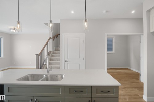 7235 182 Avenue, Edmonton, AB - Indoor Photo Showing Kitchen With Double Sink
