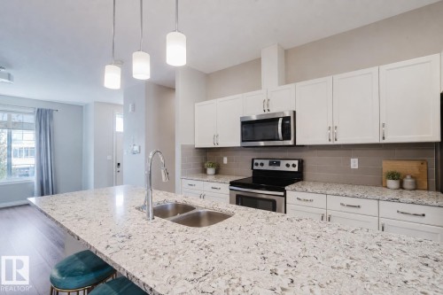 328 West Haven Drive, Leduc, AB - Indoor Photo Showing Kitchen With Double Sink With Upgraded Kitchen
