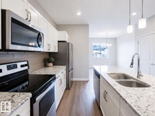 328 West Haven Drive, Leduc, AB - Indoor Photo Showing Kitchen With Double Sink With Upgraded Kitchen