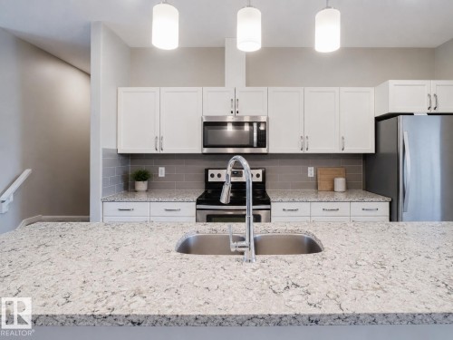 328 West Haven Drive, Leduc, AB - Indoor Photo Showing Kitchen With Double Sink With Upgraded Kitchen