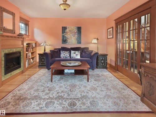 9739 86 Avenue, Edmonton, AB - Indoor Photo Showing Living Room With Fireplace