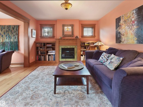 9739 86 Avenue, Edmonton, AB - Indoor Photo Showing Living Room With Fireplace