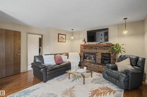 11617 26 Avenue, Edmonton, AB - Indoor Photo Showing Living Room With Fireplace