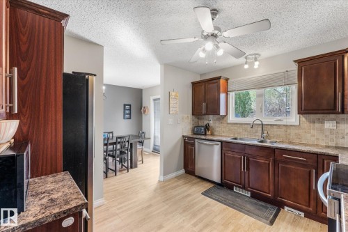 4627 10A Avenue, Edmonton, AB - Indoor Photo Showing Kitchen With Double Sink