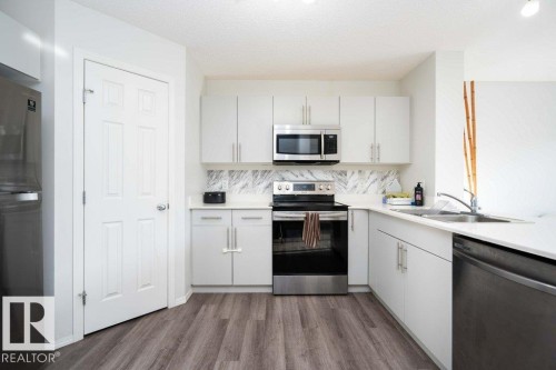 3099 Checknita Way, Edmonton, AB - Indoor Photo Showing Kitchen With Double Sink