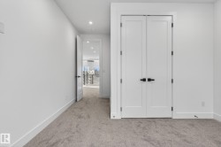 Double panel doors with matte black hardware - 