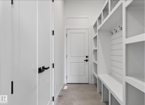 Mudroom featuring a built-in storage system with cubbies and a bench - 5820 110 Street, Edmonton, AB - Indoor Photo Showing Other Room