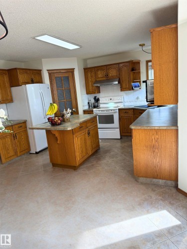 5006 59 Street, Beaumont, AB - Indoor Photo Showing Kitchen With Double Sink