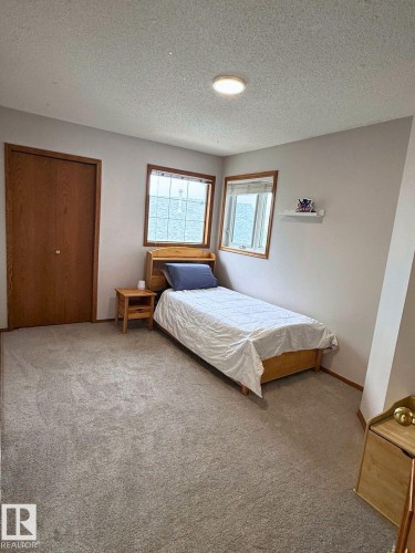5006 59 Street, Beaumont, AB - Indoor Photo Showing Bedroom
