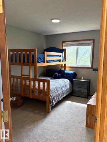 5006 59 Street, Beaumont, AB - Indoor Photo Showing Bedroom
