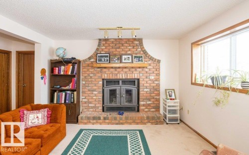 11003 104 Street, Westlock, AB - Indoor With Fireplace
