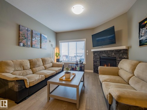 12137 103 Street, Edmonton, AB - Indoor Photo Showing Living Room With Fireplace
