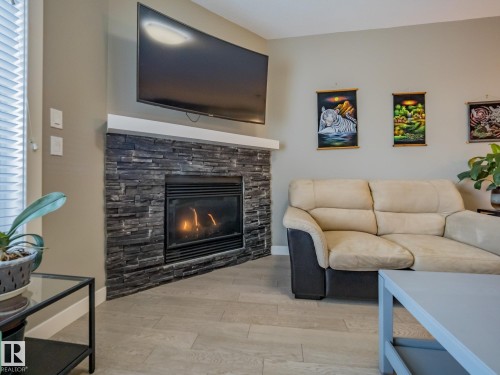 12137 103 Street, Edmonton, AB - Indoor Photo Showing Living Room With Fireplace