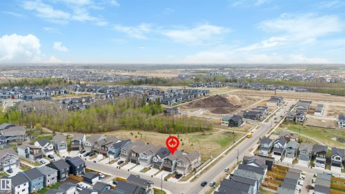Aerial perspective showcasing a residential neighborhood with varied architectural styles - 6003 Edmonds Place Nw, Edmonton, AB - Outdoor With View
