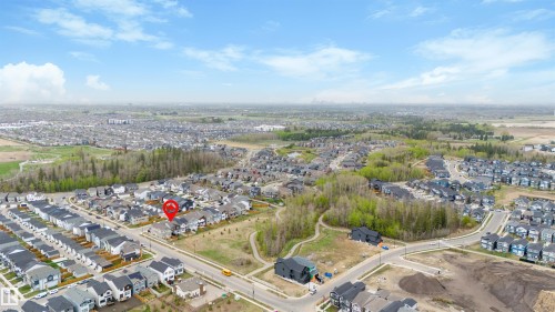 Aerial perspective showcasing a residential neighborhood with varied housing styles - 6003 Edmonds Place Nw, Edmonton, AB - Outdoor With View