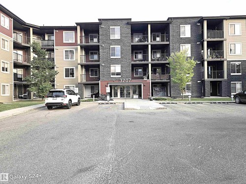 210 3207 James Mowatt Trail, Edmonton, AB - Outdoor With Balcony With Facade