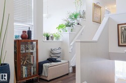 Interior stairway with white painted risers and handrails - 