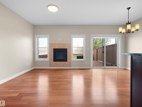 15926 10 Avenue Sw, Edmonton, AB - Indoor Photo Showing Living Room With Fireplace