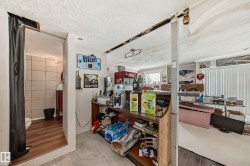 Recreational space featuring a built-in wet bar. - 